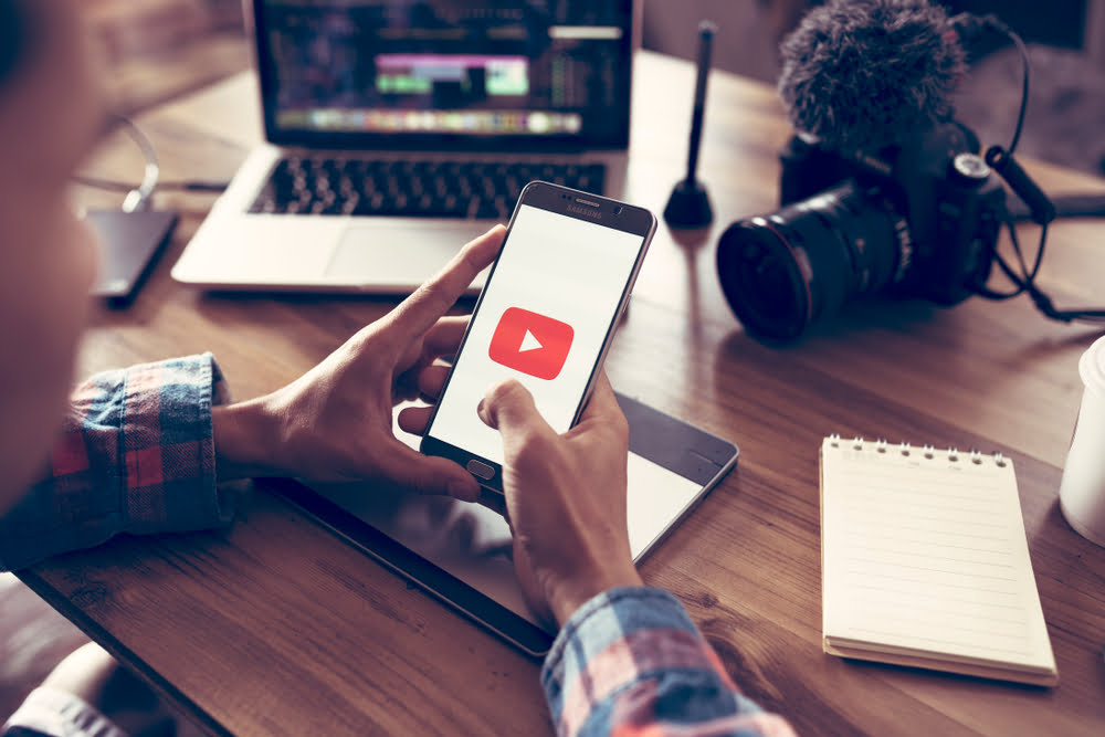 YouTube logo on smartphone