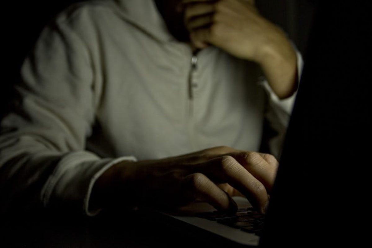 person on computer